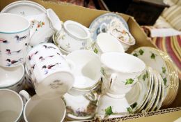 Colclough part tea service with ivy decoration on a white ground and Royal Kendall bone china mugs