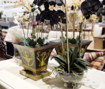 Various faux-orchids made by Bloom, one pair in painted metal planters, yellow Adams-style
