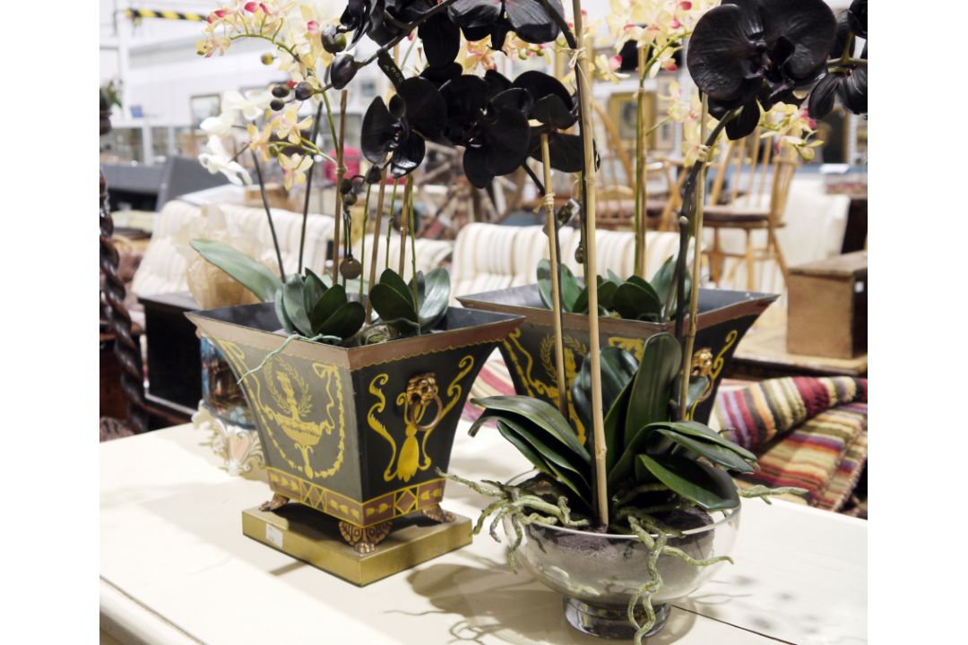 Various faux-orchids made by Bloom, one pair in painted metal planters, yellow Adams-style