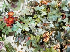 Large quantity of faux-flowers to include orchids, autumn berries, a pair of table posies, two