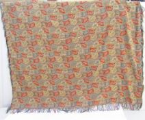 Late 19th century paisley silk shawl, in blue, red and yellow with dense floral panels and wave