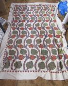 A mid-century Turkish suzani, folk art, embroidered with with pomegranates, in wool on a cotton