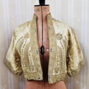 A late19th century Turkish embroidered waistcoat, gold thread with coloured wool inserts and braided