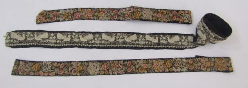 Two early 20th century embroidered silk trims, the first embroidered in coloured silks with dense