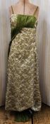 Various 1960's evening dresses to include a green and cream brocade full length evening dress