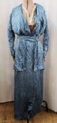 Victorian silk dress in blue, fitted as a jacket over a skirt, with belt, net fichu, the bodice with