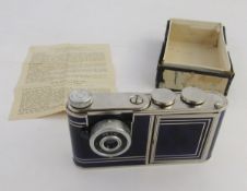 1950s Kunik Walter Petie vanity sub-miniature camera in chrome and blue enamel finish, with original