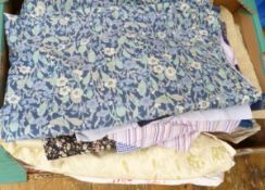 A large quantity of assorted fabrics for furnishing, dressmaking etc. (2 boxes)