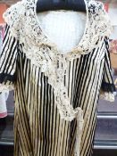 Victorian dress - cream silk with black velvet stripes, trimmed with a bobbin lace lappet ,