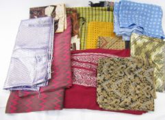 Assorted fabrics to include deep pink and grey patterned silk length, maroon cotton with silk thread