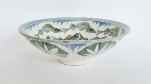 Laurence McGowan (b.1942) a stoneware bowl with internal fish decoration and external floral