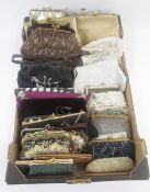 A large quantity of vintage evening bags to include beaded, petit point, faux pearls, embroidered,