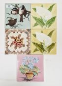 Late Victorian tile decorated with birds on branches, two similar tube-lined lily decorated tiles