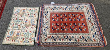 Persian rug with burgundy ground with eight floral geometric designs in centre, blue, salmon,