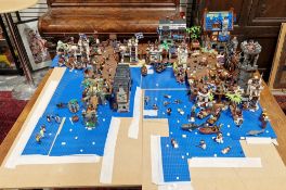 A large Lego Pirate Town diorama featuring several Lego sets to include No.4194 4194 Whitecap Bay,
