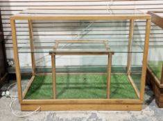 Early to mid 20th century oak and glazed shop counter display cabinet with two sliding glass doors