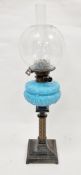 Late Victorian oil lamp with duplex burner, etched glass shade and funnel, above opaque blue glass