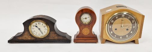 Edwardian mahogany inlaid mantel clock of waisted form, the silvered face with Arabic numerals, 18cm