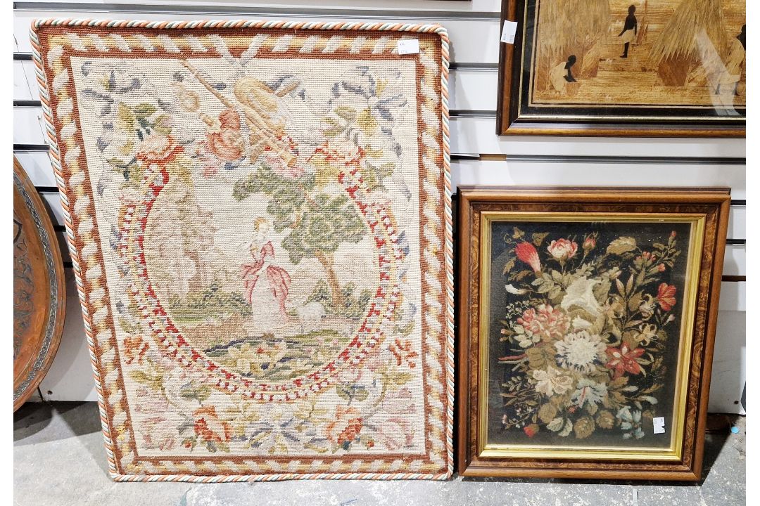 Woolwork picture depicting a classical lady with a sheep surrounded by flowers and a decorative