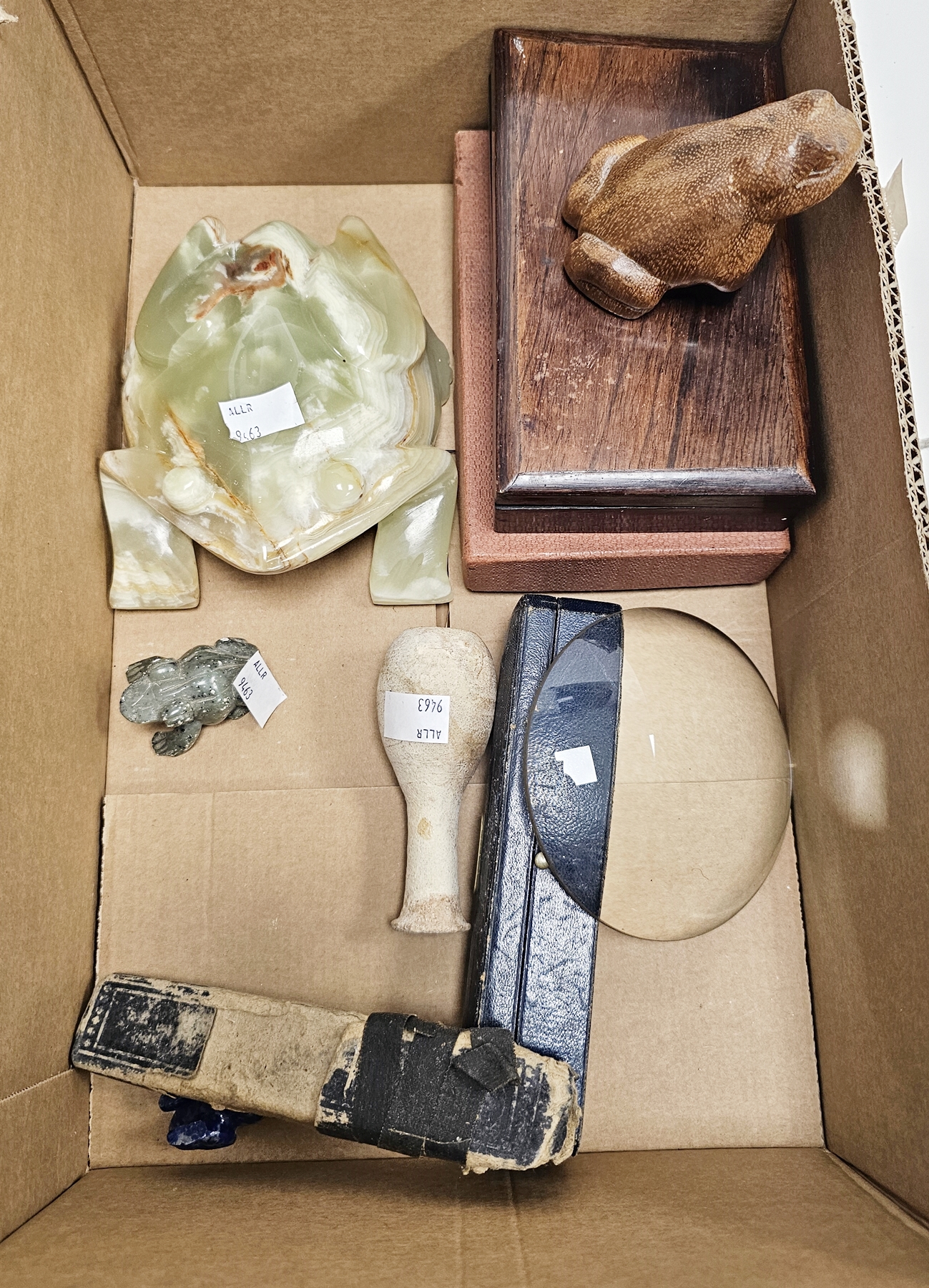 Late 19th / early 20th century leather cased set of two cut-throat razors, leather cased razing