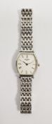 Lady's Longines stainless steel bracelet watch, the dial of shaped oval form with Roman numerals,