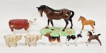 Beswick model of a chestnut horse on green base, printed black marks with green and gold label, 23cm