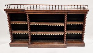 Victorian rosewood breakfront low library bookcase with a turned spindle back rail, the three