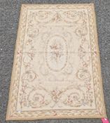 Cream ground Aubusson style floral design rug in blue, pink, mustard and green, 176cm x 117cm