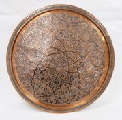 Large Indian copper and silver inlaid tray, 70cm diameter