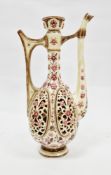 Early 20th century Zsolnay Pecs reticulated ewer having tall neck and floral pierced panels, printed
