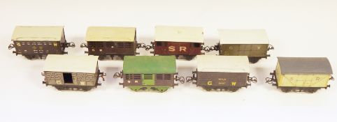 Collection of eleven tinplate 0 gauge items of rolling stock including Hornby flat truck with S R