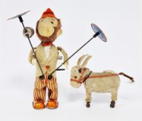 Mid 20th century Japanese tinplate clockwork monkey playing cymbals, marked made in Japan to foot