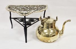 Large 19th century brass and cast iron demi-lune footman with pierced and scrolling decoration, 42cm