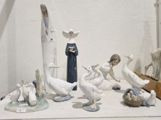 Group of Lladro and Nao figures and models of animals including a Lladro figure of virgin, 34.5cm