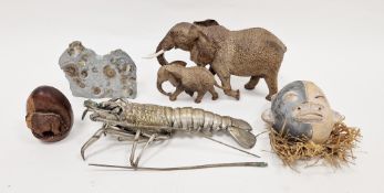 White metal articulated model of a lobster (damaged), an ammonite death bed, 11.5cm wide, a hardwood