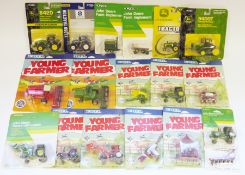 Approx. 55 Ertl carded diecast farm vehicles including 10x Young Farmers, 9x John Deere, 8x