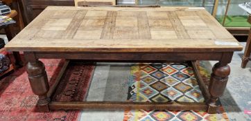 Jacobean Revival oak refectory table of pegged construction, raised on substantial plain cup and