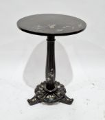 Victorian black papiermache tilt-top table by Jennens & Bettridge of London, the circular top with