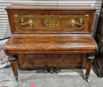 Victorian figured walnut upright piano by Chas Bampton & Co of London, the pierced back panel