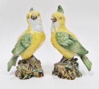 Pair of Delft polychrome models of parrots, probably Dutch, 19th century, blue script AG/15 to