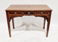 Edwardian Sheraton Revival mahogany and cross-banded desk/side table, the ogee moulded edged top