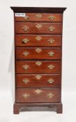 Mahogany tallboy in the George III manner, the moulded cornice over seven long graduating drawers,