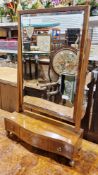 Edwardian mahogany swing dressing mirror, the rectangular plate with bevelled edge, raised on a