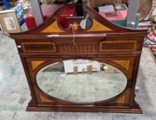 Early 20th century mahogany and satinwood inlaid overmantel mirror with broken pediment, the oval