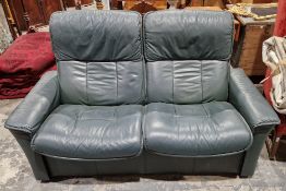 Norwegian Ekornes Stressless green leather two-seater sofa with reclining seat, 101cm high x 168cm
