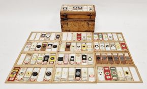 Two early to mid-20th century boxes containing laboratory glass specimen slides, the first box