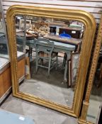 19th century gilt framed overmantel mirror, the moulded frame with rounded top corners and beaded