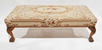 Early 20th century stool with floral needlework upholstered seat and raised on short carved cabriole