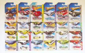 38 Mattel Hotwheels carded diecast cars and vehicles including Custom 66 GTO wagon, Muscle Mania