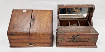 Edwardian oak tantalus, brass-mounted with hinged foliate carved front flaps opening to reveal